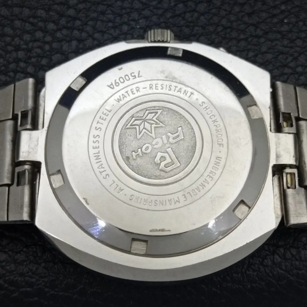 Vintage 1972 Ricoh Automatic Mens Silver Watch W/daydate & Red accents